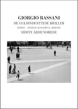 De guldindfattede briller